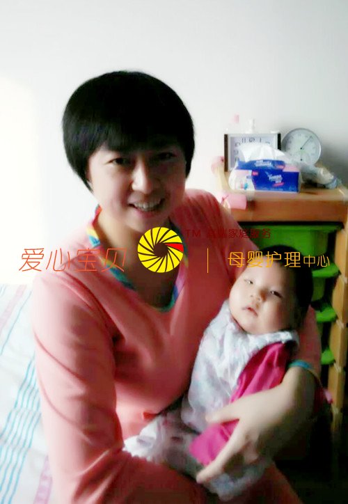宝宝是阿姨的心肝宝贝,记北京爱心宝贝家政服务公司高级育儿嫂胡菊华。